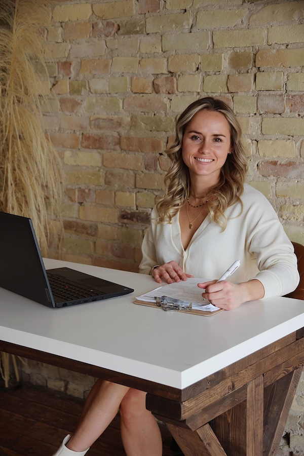 Mariah sitting at desk